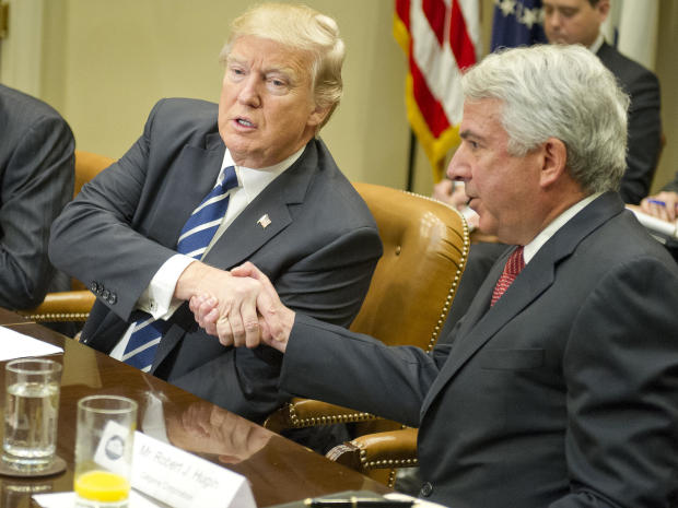 President Trump shakes hands with Bob Hugin, executive chairman of the Celgene Corporation, as he meets with representatives from PhRMA, the Pharmaceutical Research and Manufacturers of America, in the Roosevelt Room of the White House on Jan. 31, 2017, in Washington. 