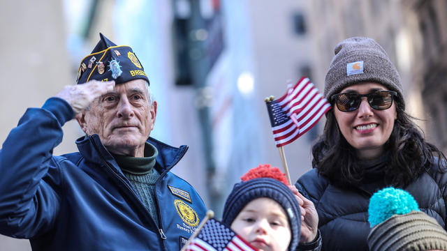 People attend the Veterans Day parade in New York City 