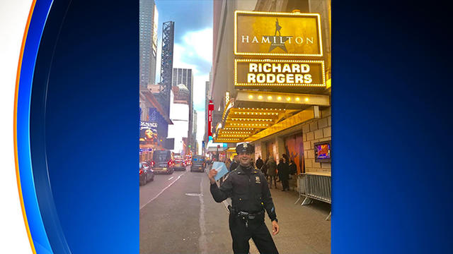 officer-helps-buy-hamilton-tickets-nypd.jpg 