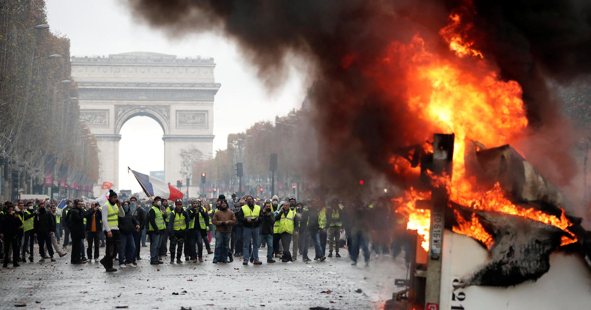 French police fire tear gas at demonstrators as anti-restriction convoy  enters Paris