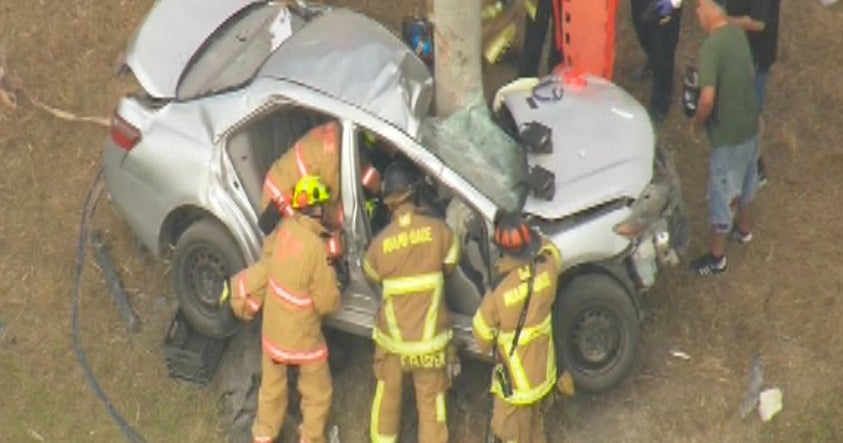 Miami-Dade Rescue Units Extract Driver From Vehicle Wrapped Around Tree ...