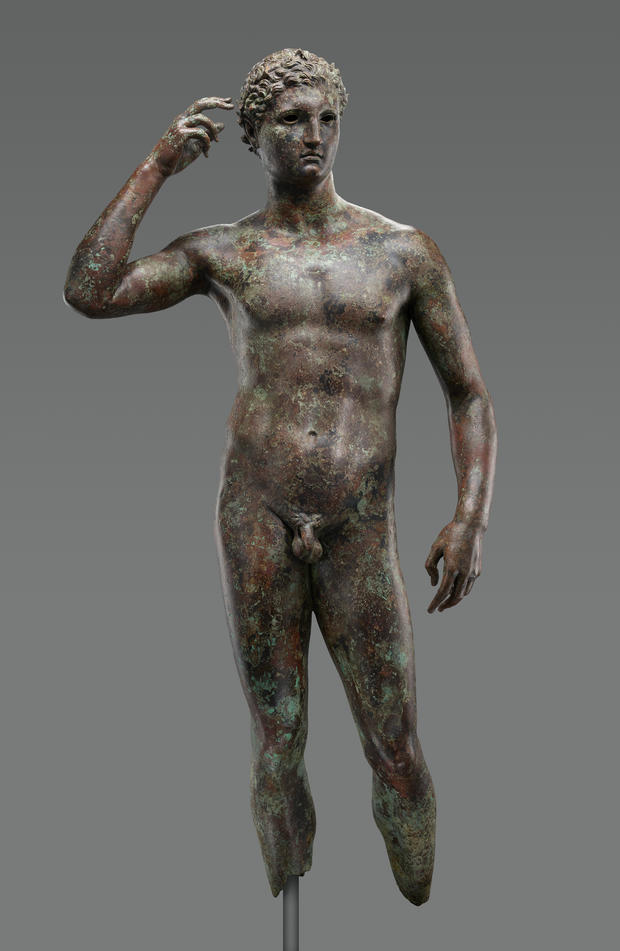 Greek bronze statue Victorious Youth 