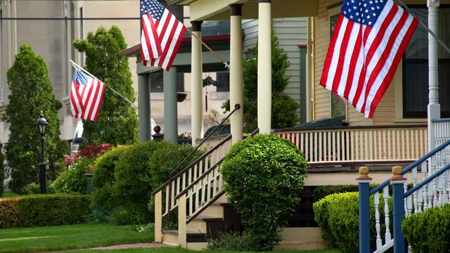 American dream - flags flying from houses front porches - generic 