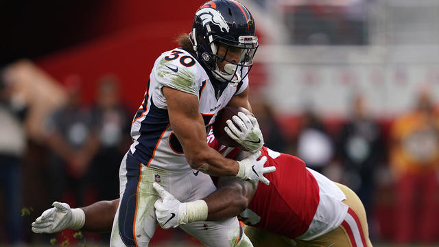 Cassius Marsh of the San Francisco 49ers celebrates after sacking