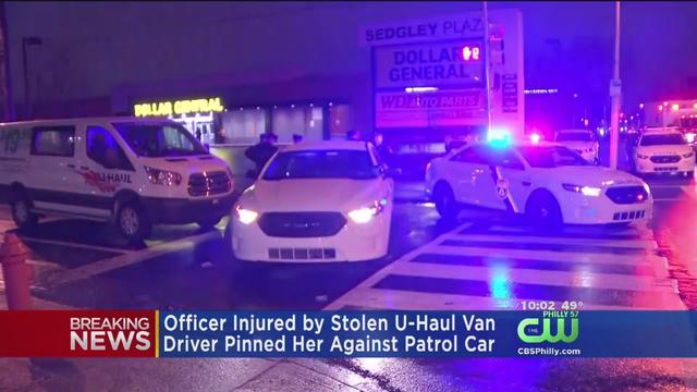 Philly-officer-pinned-stolen-van.jpg 