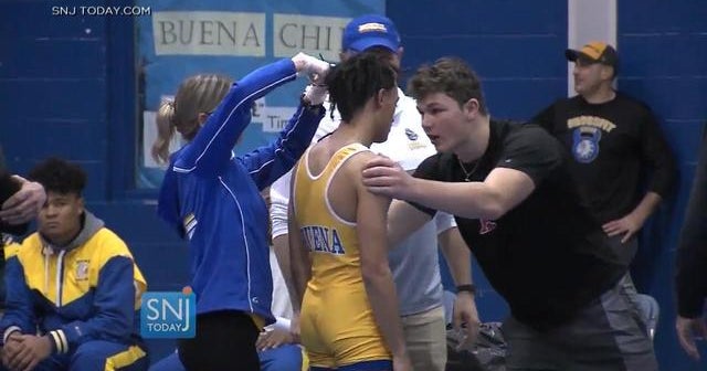 Wrestler forced to cut dreadlocks CBS News