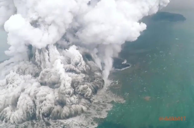 A plume of ash rises as Anak Krakatau erupts in Indonesia 