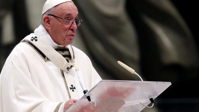 Pope Francis leads the Christmas Eve mass in Saint Peter's Basilica at the Vatican 