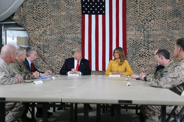 U.S. President Trump meets political and military leaders during an unannounced visit to Al Asad Air Base 