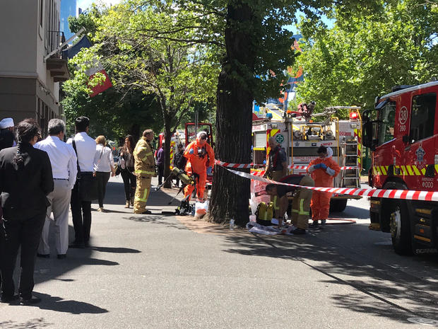 Hazmat and fire crews are seen outside the Indian and French Consulates on St Kilda Road in Melbourne 