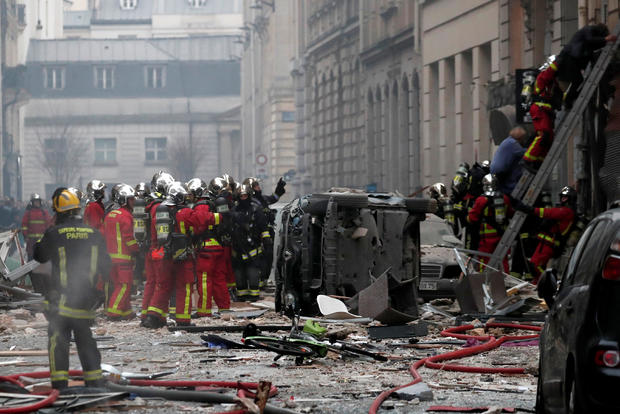 Firemen work at the site of an explosion in a bakery shop in the 9th District in Paris 