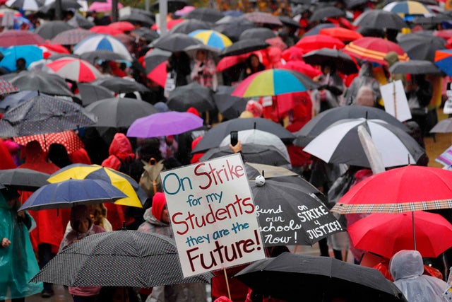 Some of the more than 30,000 teachers in the Los Angeles public school system hold a rally at City Hall 