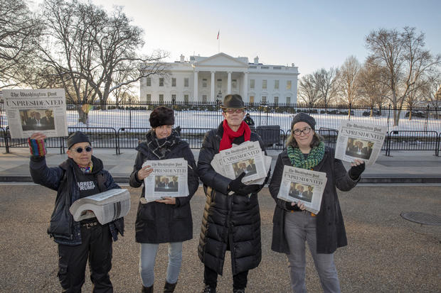 Activists Distribute "Bye-Bye 45" A Satire Edition Of The Washington Post 