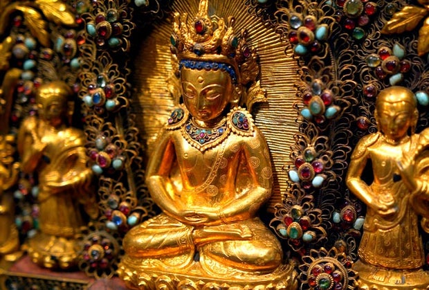 plaque of a crowned Buddha from the 19th century 