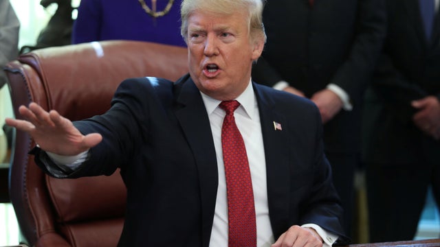 U.S. President Trump speaks to reporters at meeting with manufacturing workers at the White House in Washington 