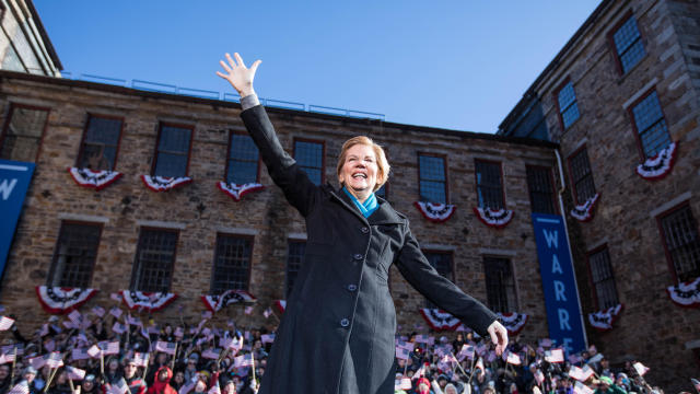 Potential 2020 Democratic presidential nomination candidate U.S. Senator Elizabeth Warren (D-MA) waves at the crowd ahead of a campaign rally in Lawrence 