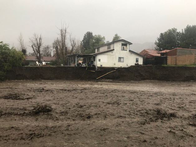 Teetering Lake Elsinore Home At Risk Of Collapse In Flooding Creek