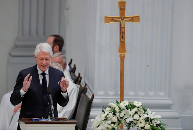 Former U.S. President Clinton speaks during funeral Mass for late U.S. Rep. Dingell at Holy Trinity Church in Washington 