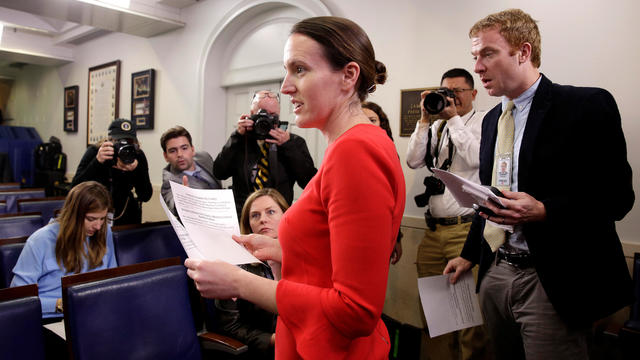 Deputy White House Press Secretary Lindsay Walters hands out a statement relating to the firing of the Director of the FBI James Comey by U.S. President Donald Trump at the White House in Washington 