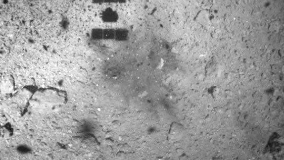 Hayabusa 2 space probe is seen after it landed on the Ryugu asteroid, in this handout image released by Japan Aerospace Exploration Agency 