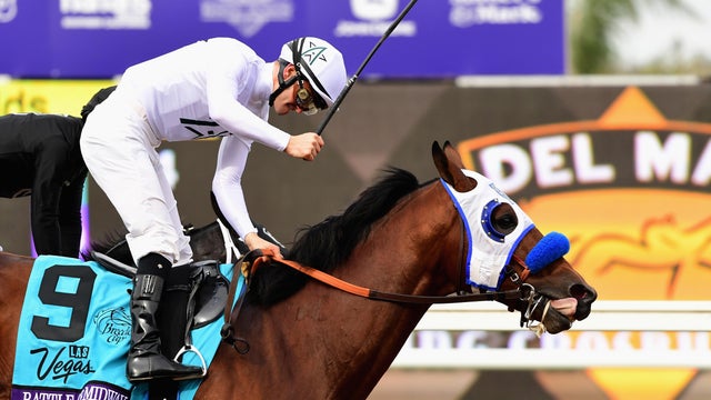 Jockey Flavien Prat (#9) celebrates after riding Battle Of Midway to a win in the Las Vegas Breeder's Cup Dirt Mile on day one of the 2017 Breeder's Cup World Championship at Del Mar Race Track on Nov. 3, 2017, in Del Mar, California. 