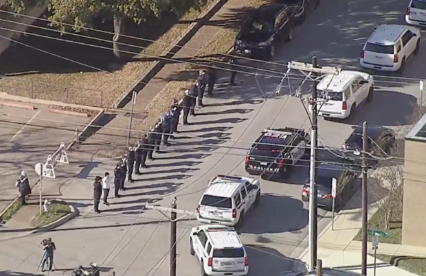 body of Midland fallen officer arrives at Tarrant County ME's Office 