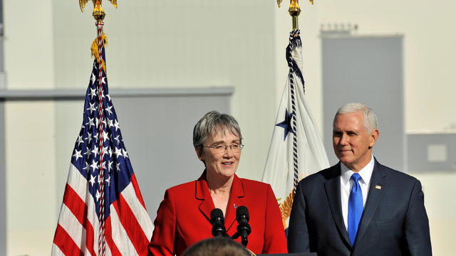 U.S. Vice President Mike Pence listens as Air Force Secretary Heather Wilson addresses USAF personnel after the launch of SpaceX Falcon 9 rocket was postponed, at Cape Canaveral 