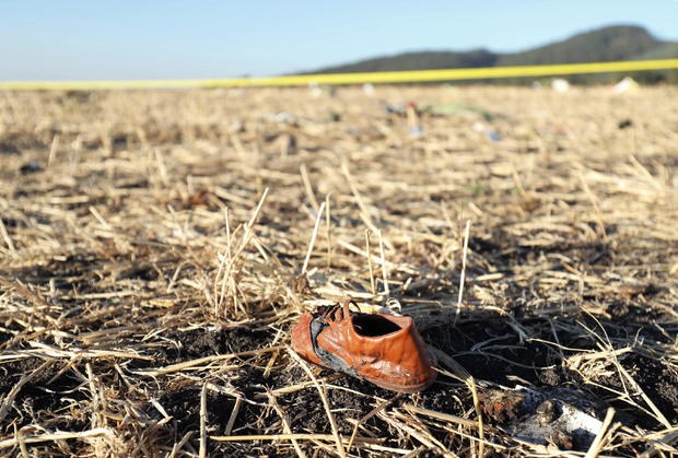 A shoe of a passenger is seen at the scene of the Ethiopian Airlines Flight ET 302 plane crash, near the town of Bishoftu, southeast of Addis Ababa 