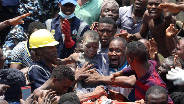 cbsn-fusion-desperate-rescue-efforts-underway-for-children-trapped-beneath-collapsed-school-building-in-nigeria-thumbnail-1803058-640x360.jpg 