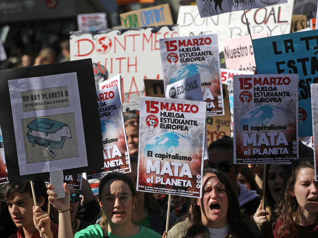Students protest to demand global action on climate change as part of the "Fridays for Future" movement in Madrid 