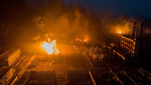 Smoke billows from fire following an explosion at the pesticide plant owned by Tianjiayi Chemical, in Xiangshui 