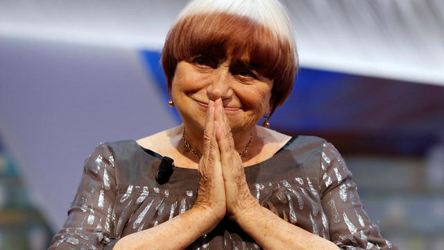 FILE PHOTO: Filmmaker Agnes Varda reacts being awarded with an honorary Palme d'Or during the closing ceremony of the 68th Cannes Film Festival in Cannes 