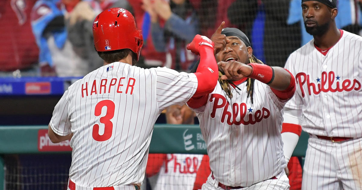 Phillies beat Braves on opening day behind Rhys Hoskins' grand slam in Bryce  Harper's debut