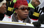 Lesley McSpadden, mother of Michael Brown, helps lead the "Justice For All" rally and march in the nation's capital against police brutality and the killing of unarmed black men by police Dec. 13, 2014, in Washington. 