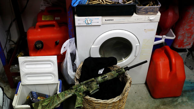 Noel Womersley's AR-15 semi-automatic rifle is seen in the garage of his house outside Christchurch 