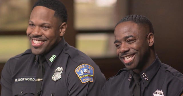 How 2 cops are using their musical talents to unite a community - CBS News
