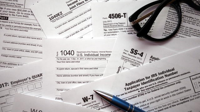 US tax forms background 