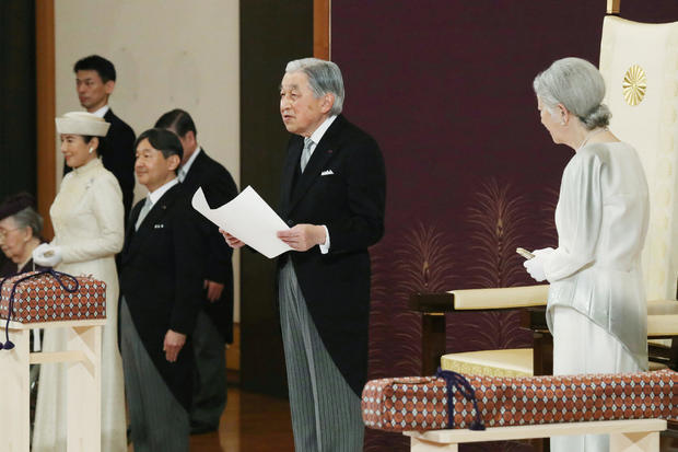 Japan's Emperor Akihito, flanked by Empress Michiko, Crown Prince Naruhito and Crown Princess Masako, delivers a speech during a ritual called Taiirei-Seiden-no-gi, a ceremony for the Emperor's abdication, at the Imperial Palace in Tokyo 