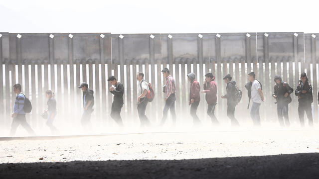 Swelling Numbers Of Migrants Overwhelm Southern Border Crossings 