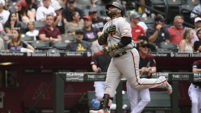 Wilmer Flores of the San Francisco Giants hits a solo home run during  News Photo - Getty Images