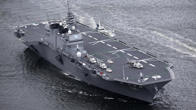 An aerial photo shows the JS Kaga of Japan's Maritime Self-Defense Force entering Osaka Port in Osaka on May 19, 2018. 