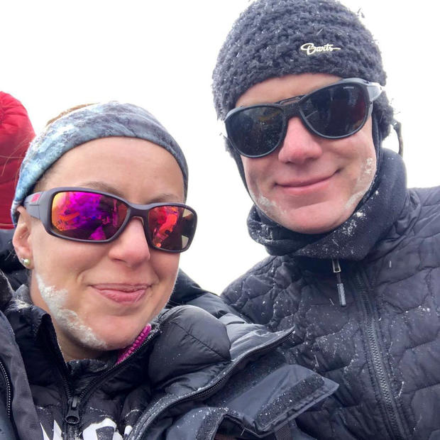 Robin Fisher and partner Kristyn Carriere take a selfie at Everest Base Camp 