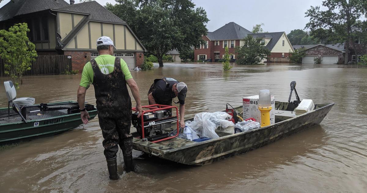 Arkansas River reaches record levels as flooding turns deadly CBS News