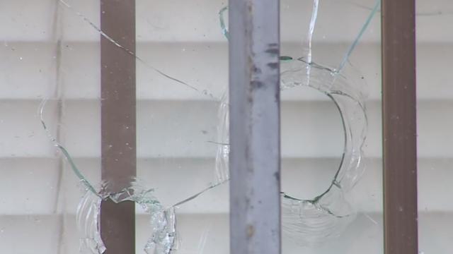 bullet-holes-glass-stockton.jpg 