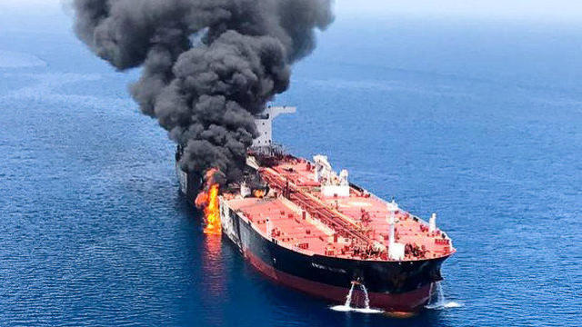 An oil tanker is seen after it was attacked at the Gulf of Oman 