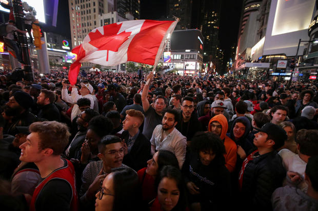 Fans celebrate in the streets of Toronto, Canada after the Toronto Raptors win the NBA Championship in Toronto 