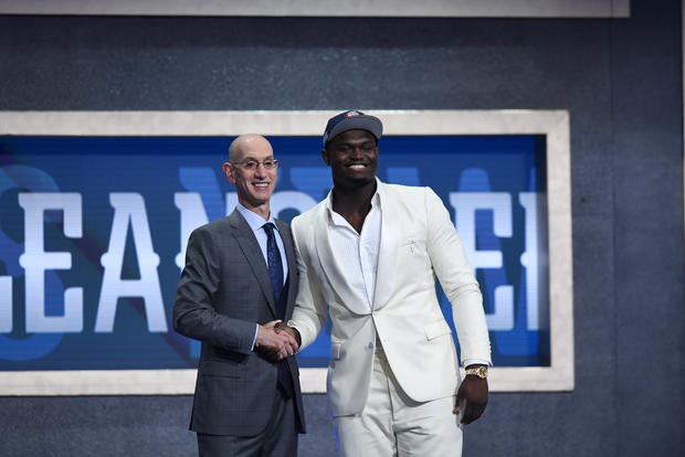 Zion Williamson poses with NBA Commissioner Adam Silver 