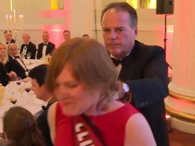 U.K. Foreign Office Minister Mark Field forcibly removes Greenpeace protester Janet Barker during the gala Mansion House dinner in London June 20, 2019, in an image capture taken from video. 