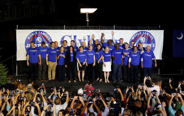 The 21 Democratic presidential candidates along with SC Rep. Jim Clyburn take the stage during "Jim Clyburn's World Famous Fish Fry" in Columbia 