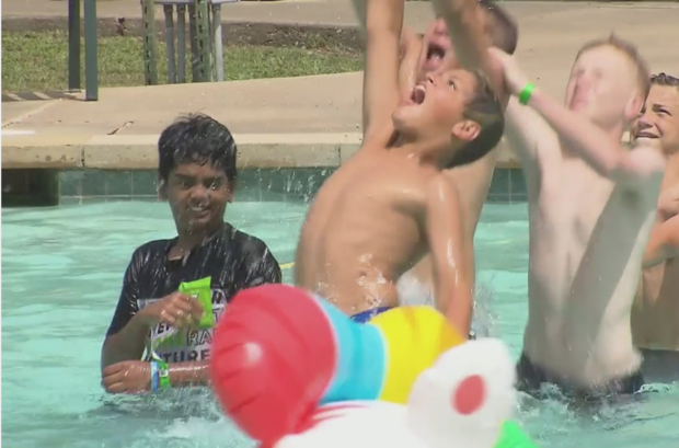 Children with cancer splash around at Camp I Hope 